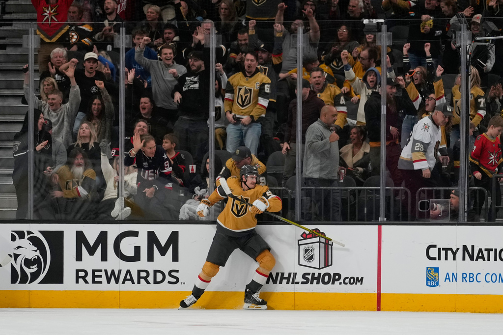 Vegas Golden Knights center Brett Howden (21) reacts after scoring against the Ottawa Senators during the first period of an NHL hockey game Wednesday, Nov. 26, 2025, in Las Vegas. (AP Photo/Lucas Peltier)