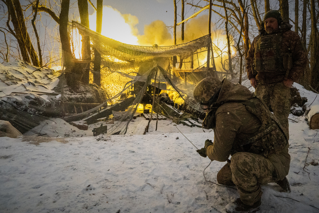 FILE - Ukrainian soldiers fire at Russian positions on the front line in the Kharkiv region of Ukraine, Feb. 18, 2026. (AP Photo/Andrii Marienko, File)