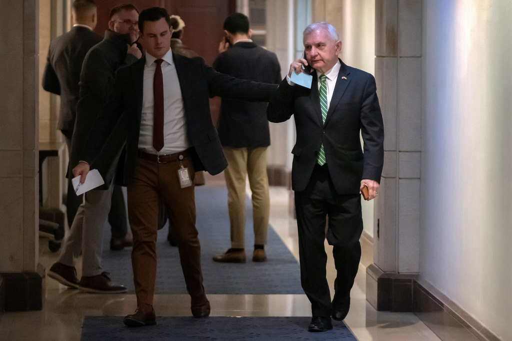 Senate Armed Services Committee ranking member Sen. Jack Reed, D-R.I., leaves after a meeting with U.S. Navy Adm. Frank M. Bradley on Capitol Hill, Thursday, Dec. 4, 2025, in Washington. (AP Photo/Mark Schiefelbein)