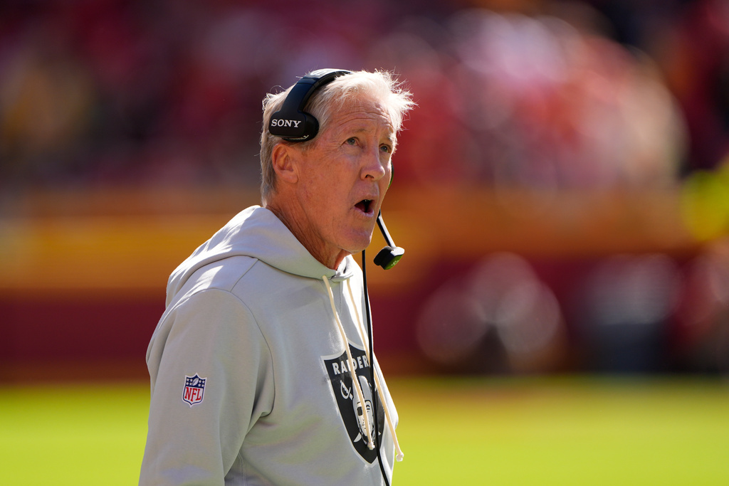Las Vegas Raiders head coach Pete Carroll watches from the sidelines during the first half of an NFL football game against the Kansas City Chiefs Sunday, Oct. 19, 2025, in Kansas City, Mo. (AP Photo/Charlie Riedel)