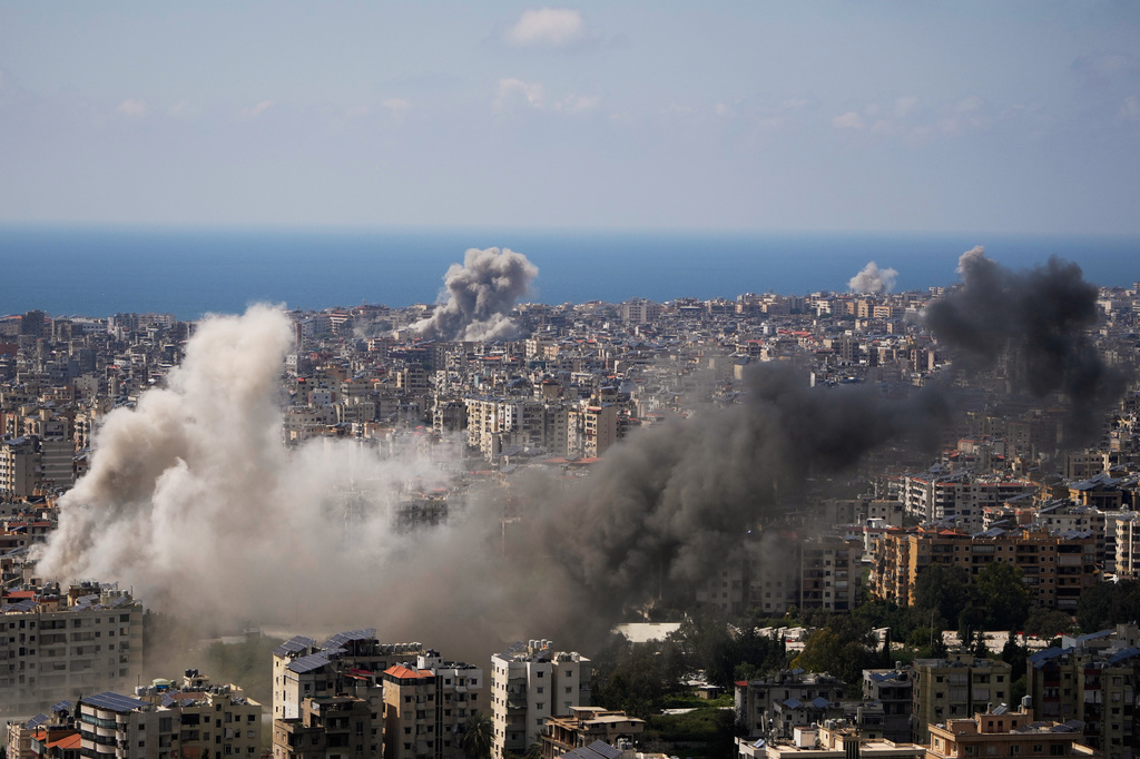 Smoke rises following several Israeli airstrikes in Beirut, Lebanon, Wednesday, April 8, 2026. (AP Photo/Hassan Ammar)