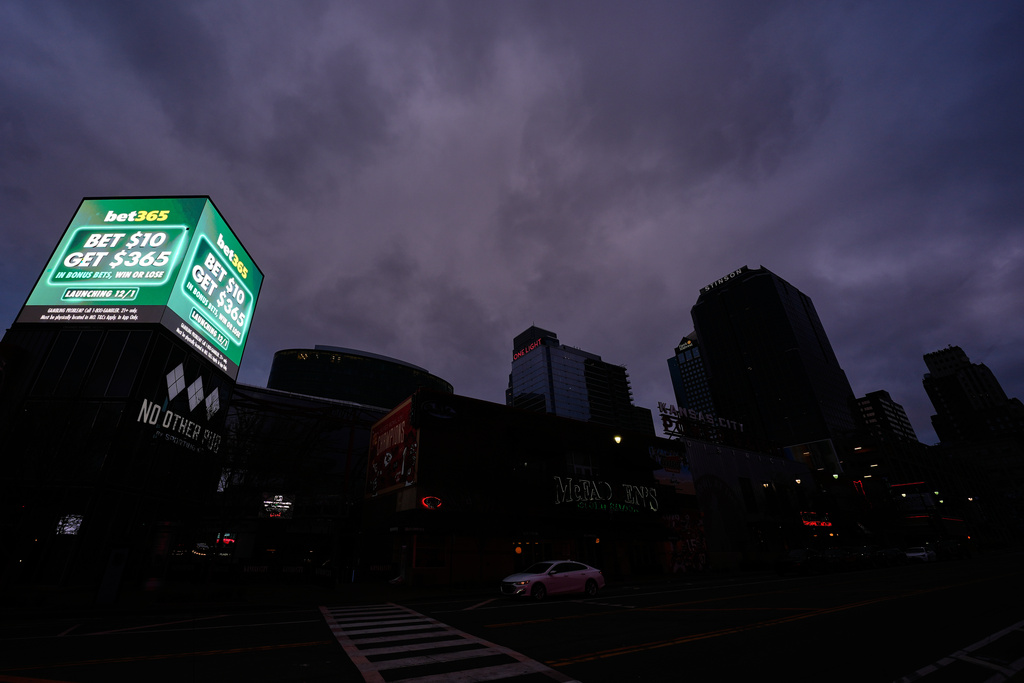 Advertisements for sports betting apps are seen in downtown Kansas City, Mo., Saturday, Nov. 29, 2025. (AP Photo/Charlie Riedel)