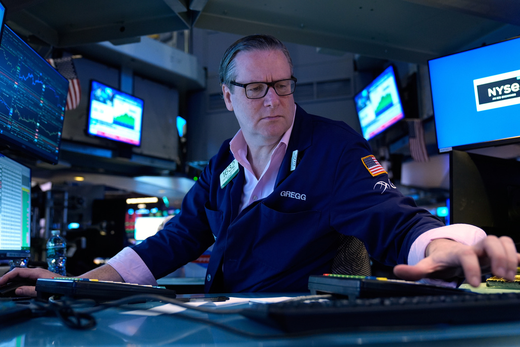 Gregg Maloney works on the floor at the New York Stock Exchange in New York, Tuesday, March 10, 2026. (AP Photo/Seth Wenig)