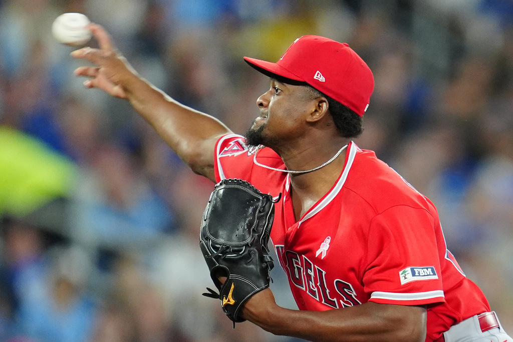 Los Angeles Angels pitcher José Soriano (59) throws against the Toronto Blue Jays during first inning MLB baseball action in Toronto on Sunday, May 10, 2026. (Frank Gunn/The Canadian Press via AP)