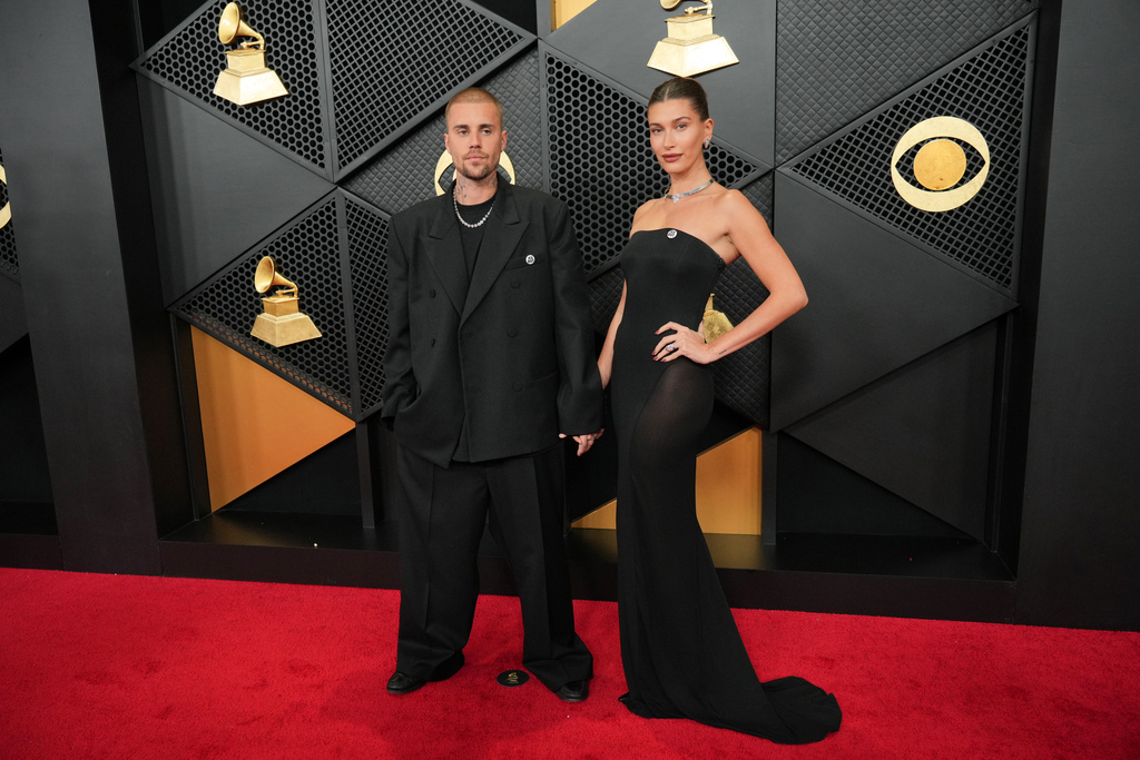 Justin Bieber, left, and Hailey Bieber arrive at the 68th annual Grammy Awards on Sunday, Feb. 1, 2026, in Los Angeles. (Photo by Jordan Strauss/Invision/AP)