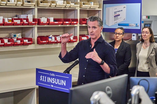 California Gov. Gavin Newsom announces CalRx-branded insulin glargine pens available next Jan. 1, 2026, at a suggested retail price of no more than $55 per five-pack, or $11 per pen, during a news conference at Cedar-Sinai's Mark Goodson pharmacy in Los Angeles Thursday, Oct. 16, 2025. Secretary Kim Johnson, Cal HHS Agency, middle. (AP Photo/Damian Dovarganes) California Gov. Gavin Newsom announces CalRx-branded insulin glargine pens available next Jan. 1, 2026, at a suggested retail price of no more than $55 per five-pack, or $11 per pen, during a news conference at Cedar-Sinai's Mark Goodson pharmacy in Los Angeles Thursday, Oct. 16, 2025. Secretary Kim Johnson, Cal HHS Agency, middle. (AP Photo/Damian Dovarganes)