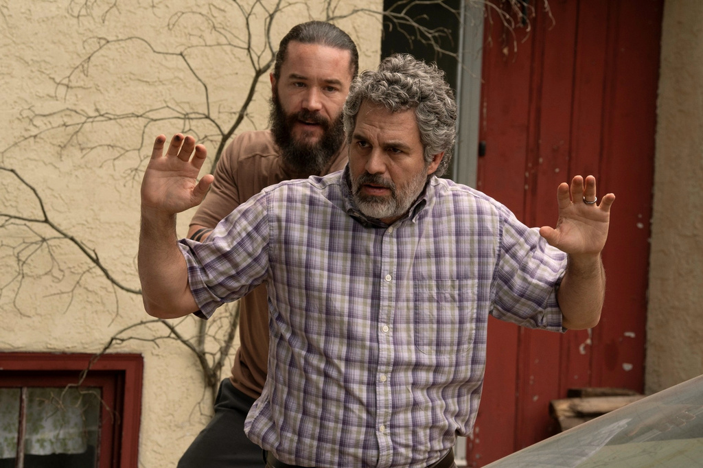 This image released by HBO shows Mark Ruffalo, foreground, and Tom Pelphrey in a scene from "Task." (HBO via AP)