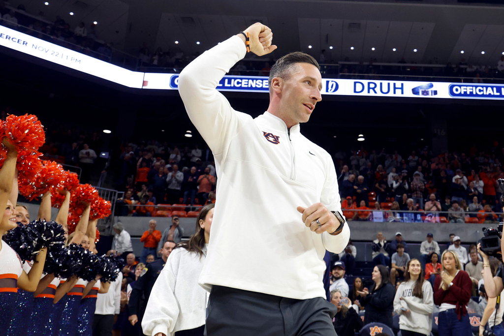 Auburn head coach Steven Pearl reacts as he walks onto the court during the first half of an NCAA college basketball game against Bethune-Cookman, Monday, Nov. 3, 2025, in Auburn, Ala. (AP Photo/Butch Dill)