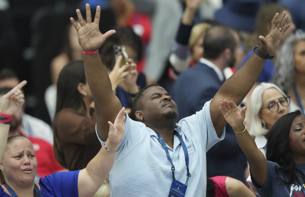 Supporters attend a memorial for Charlie Kirk, Sunday, Sept. 21, 2025, at State Farm Stadium in Glendale, Ariz. (AP Photo/Ross D. Franklin)