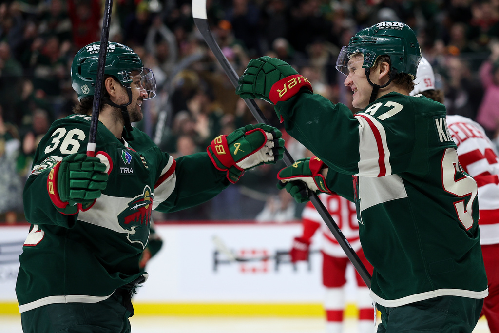 Minnesota Wild right wing Mats Zuccarello, left, celebrates his goal with left wing Kirill Kaprizov during the third period of an NHL hockey game against the Detroit Red Wings Thursday, Jan. 22, 2026, in St. Paul, Minn. (AP Photo/Matt Krohn)