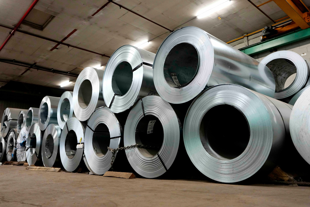 Steel coils, which will be made into roofing, siding and HVAC products, are seen in the manufacturing plant at Ideal Roofing in Ottawa, on Tuesday, Aug. 25, 2026. (Justin Tang/The Canadian Press via AP)