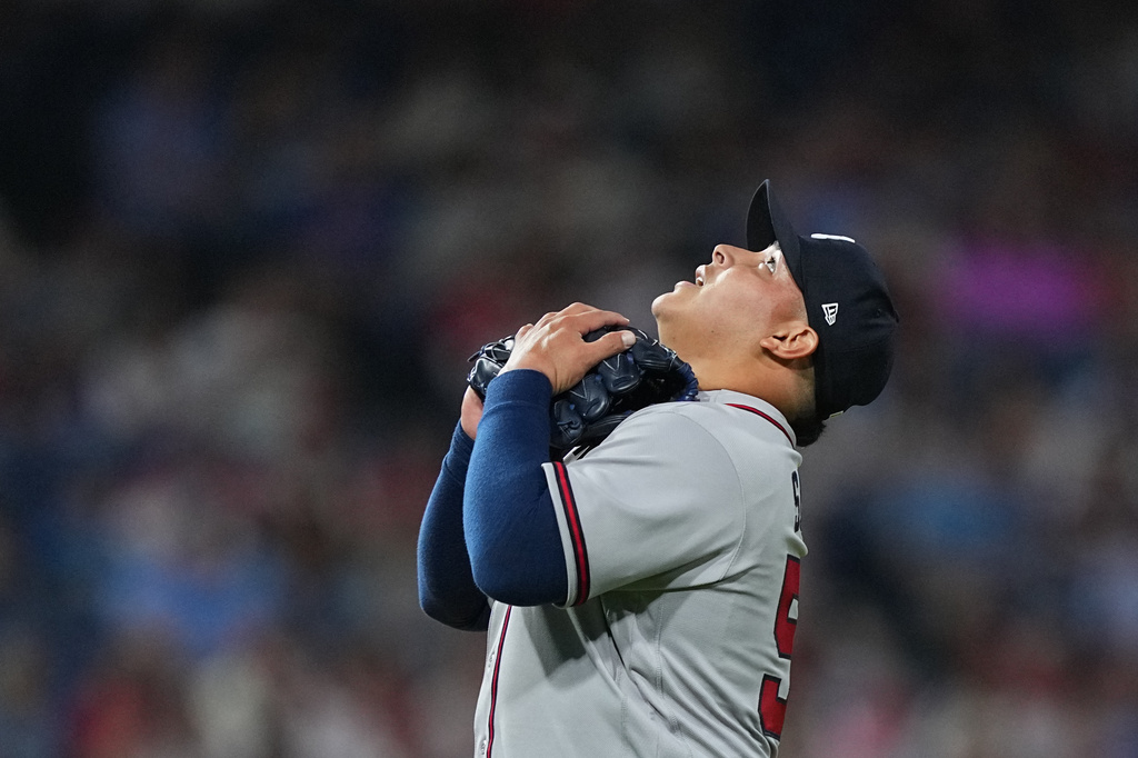 Atlanta Braves pitcher José Suarez reacts after a winning baseball game against the Philadelphia Phillies, Friday, April 17, 2026, in Philadelphia. (AP Photo/Matt Rourke)