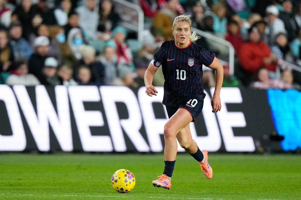 FILE - United States midfielder Lindsey Heaps kicks the ball during the second half of a women's international friendly soccer match against New Zealand, Wednesday, Oct. 29, 2025, in Kansas City, Mo. (AP Photo/Charlie Riedel, file)