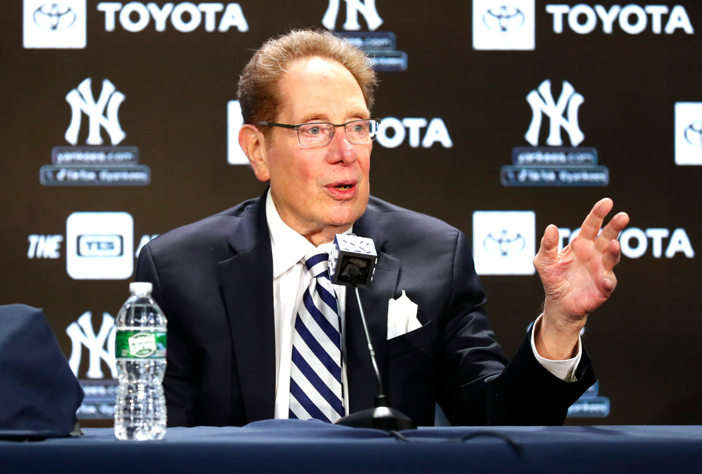 FILE - New York Yankees broadcaster John Sterling answers questions from reporters during a baseball press conference before a retirement ceremony at Yankee Stadium in New York, April 20, 2024. (AP Photo/Noah K. Murray, file)