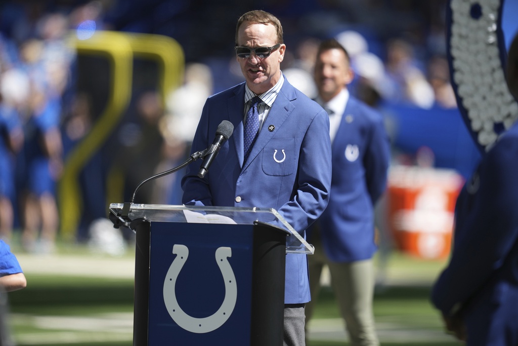 Former Indianapolis Colts' Peyton Manning speaks during halftime of an NFL football game between the Colts and the Miami Dolphins Sunday, Sept. 7, 2025, in Indianapolis. (AP Photo/Darron Cummings)