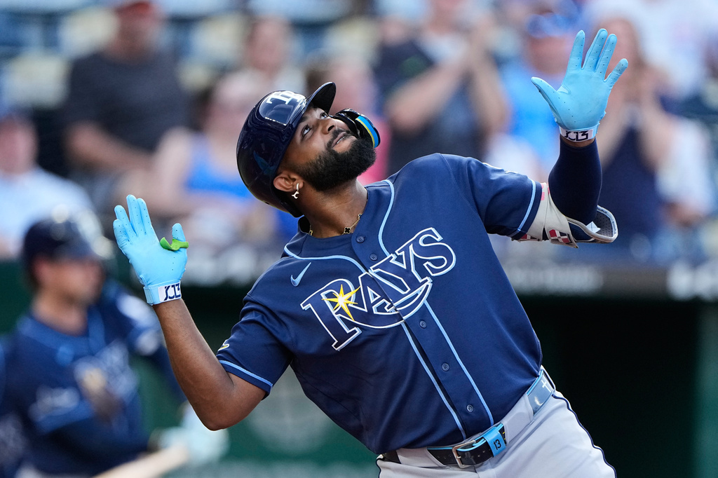 Tampa Bay Rays' Junior Caminero celebrates after hitting a three-run home run during the third inning of a baseball game against the Kansas City Royals, Tuesday, June 30, 2026, in Kansas City, Mo. (AP Photo/Charlie Riedel)