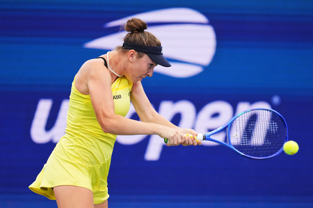 Linda Noskova, of the Czech Republic, returns the ball to Katie Volynets, of the United States, during the first round of the U.S. Open tennis championships, Monday, Aug. 31, 2026, in New York. (AP Photo/Kirsty Wigglesworth)