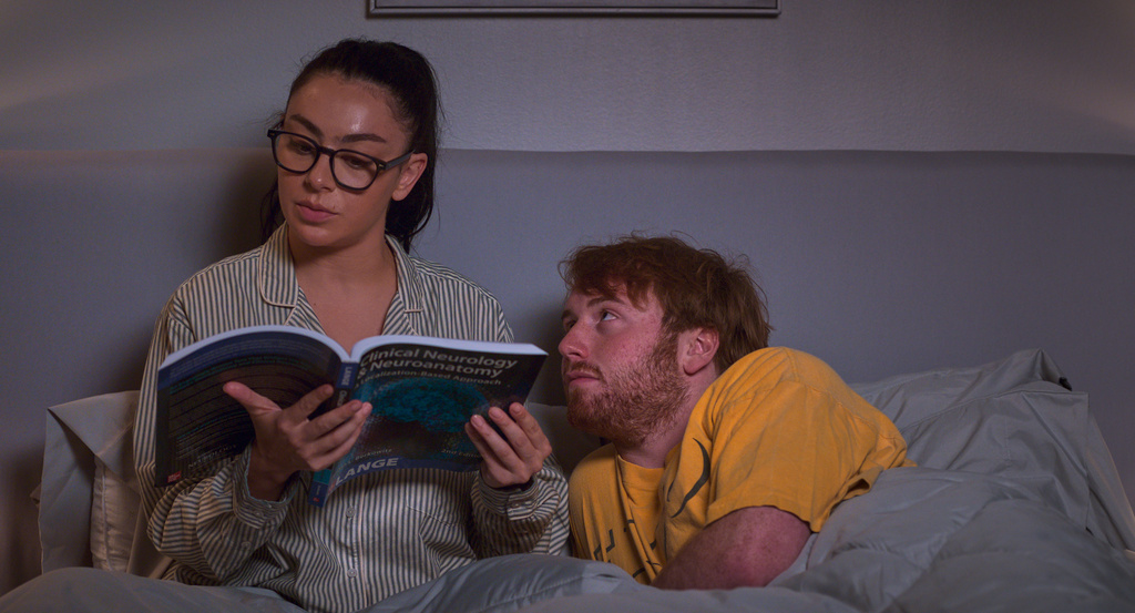 This image released by Magnolia Pictures shows Charli xcx, left, and Cooper Hoffman in a scene from "I Want Your Sex." (Magnolia Pictures via AP)