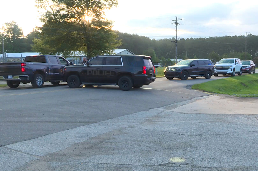 Law enforcement vehicles gather near the Bertie-Martin Regional Detention Center that was partly taken over on Monday, June 29, 2026, Windsor, Bertie County, N.C. (WITN via AP)