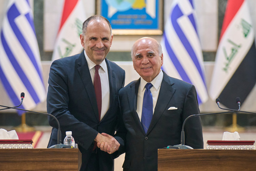 Iraqi Foreign Minister Fuad Hussein, right, shakes hands with his Greek counterpart George Gerapetritis, in Baghdad, Iraq, Thursday, Oct. 30, 2025. (AP Photo/Hadi Mizban) Iraqi Foreign Minister Fuad Hussein, right, shakes hands with his Greek counterpart George Gerapetritis, in Baghdad, Iraq, Thursday, Oct. 30, 2025. (AP Photo/Hadi Mizban)