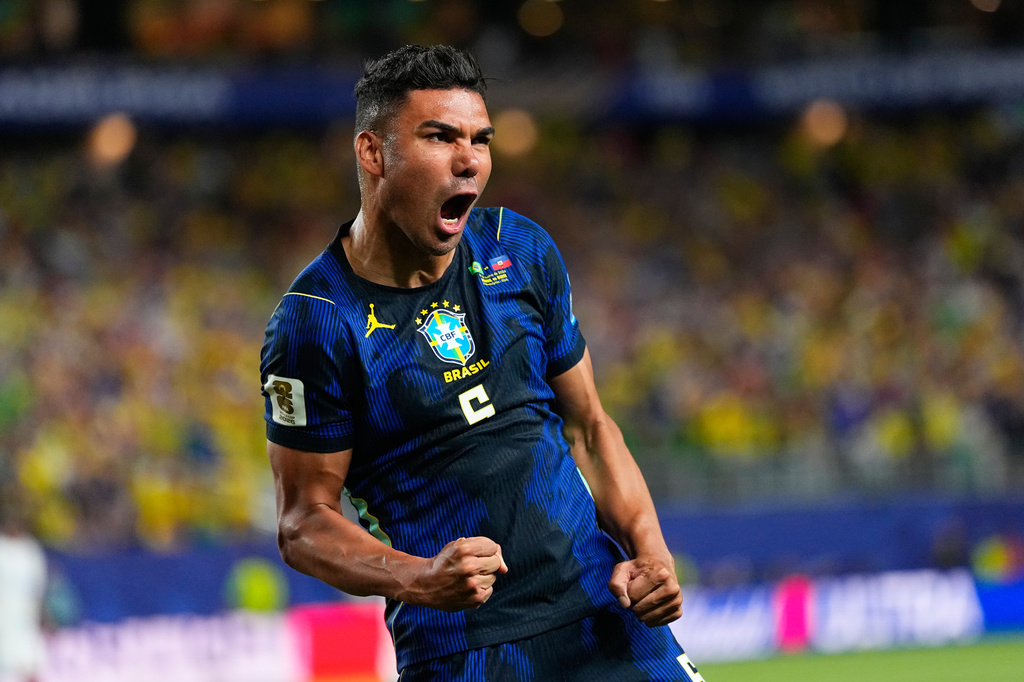 FILE - Brazil's Casemiro (5) celebrates his side's second goal by Matheus Cunha (9) during the World Cup Group C soccer match between Brazil and Haiti in Philadelphia, Friday, June 19, 2026. (AP Photo/Petr David Josek, File