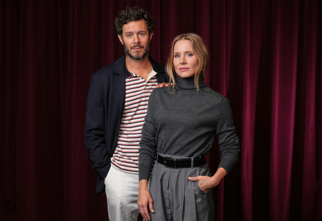 Adam Brody, left, and Kristen Bell, cast members in the Netflix series "Nobody Wants This," pose for a portrait in Los Angeles on Oct. 16, 2025. (AP Photo/Chris Pizzello)
