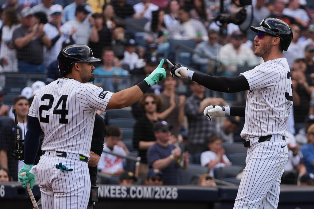 New York Yankees' Cody Bellinger, right, celebrates withJasson Domínguez after hitting a home run during the fifth inning of a baseball game against the Baltimore Orioles Saturday, May 2, 2026, in New York. (AP Photo/Frank Franklin II)