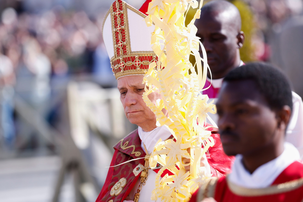 Pope Leo XIV presides over Palm Sunday Mass in St. Peter's Square at the Vatican, Sunday, March 29, 2026. (Remo Casilli/Pool Photo via AP)
