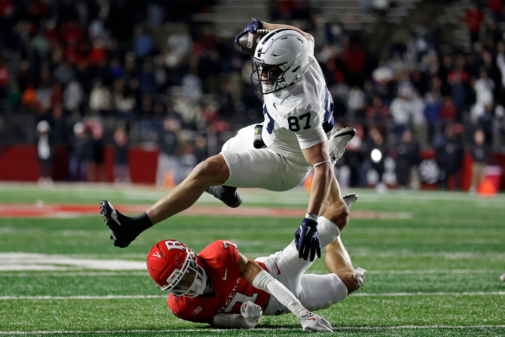 Penn State tight end Andrew Rappleyea (87) is tackled by Rutgers defensive back Cam Miller late in the second half of an NCAA college football game Saturday, Nov. 29, 2025, in Piscataway, N.J. (AP Photo/Adam Hunger)