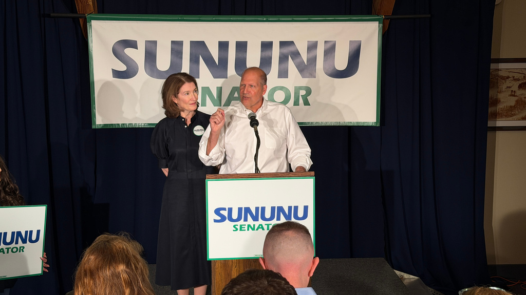 Republican U.S. Senate nominee John E. Sununu gesturing while addressing supporters in Manchester, N.H., on Tuesday, Sept. 8, 2026, shortly after winning his party's primary election. (AP Photo/Rodrique Ngowi)