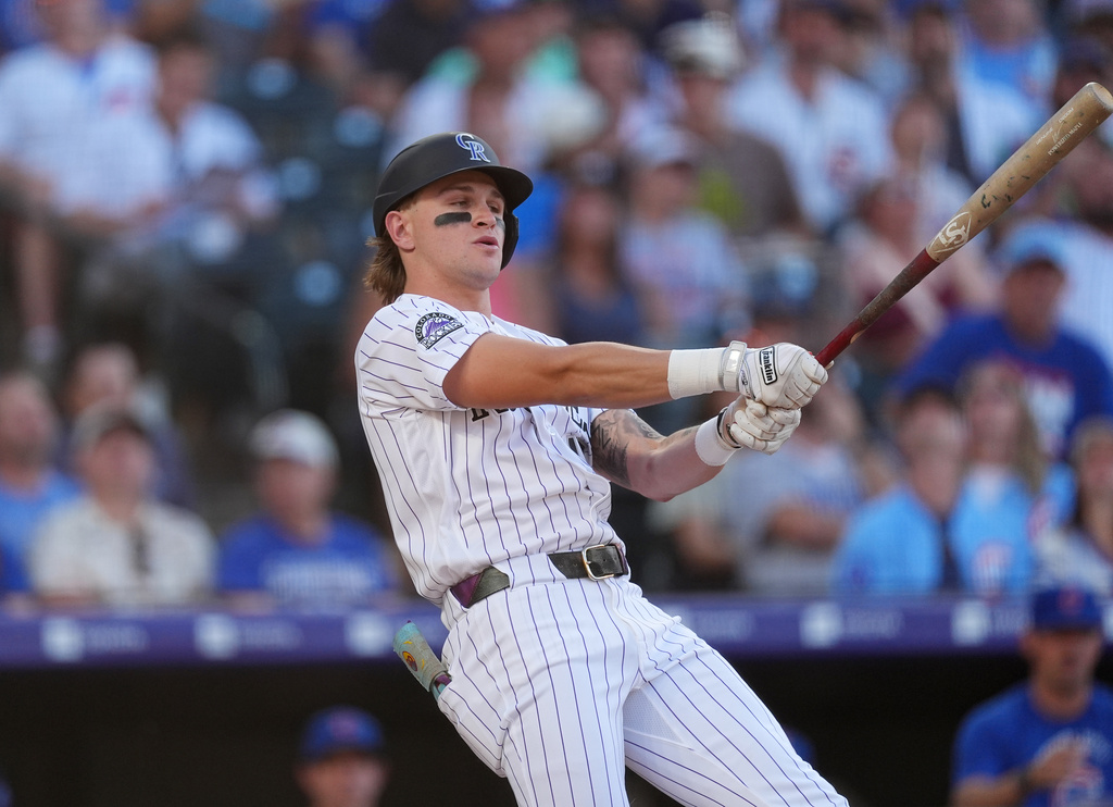 Colorado Rockies' Cole Carrigg fouls off a pitch from Chicago Cubs starting pitcher Shota Imanaga in the second inning of a baseball game, Wednesday, June 10, 2026, in Denver. (AP Photo/David Zalubowski)