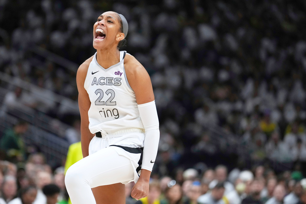 FILE - Las Vegas Aces center A'ja Wilson reacts during the second half of Game 2 against the Seattle Storm in the first round of the WNBA basketball playoffs Tuesday, Sept. 16, 2025, in Seattle. (AP Photo/Lindsey Wasson, File)