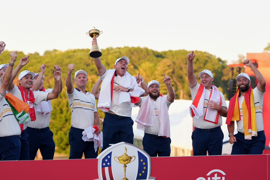 Europe' poses with the trophy after winning the Ryder Cup golf tournament against the United States on the Bethpage Black golf course, Sunday, Sept. 28, 2025, in Farmingdale, N.Y. (AP Photo/Matt Slocum)