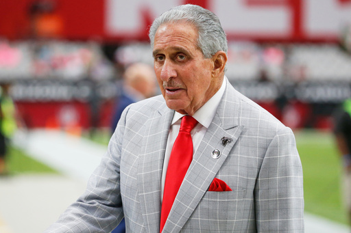FILE - Atlanta Falcons owner Arthur Blank stands on the field prior to an NFL football game against the Arizona Cardinals, Oct. 13, 2019, in Glendale, Ariz. (AP Photo/Rick Scuteri, File) FILE - Atlanta Falcons owner Arthur Blank stands on the field prior to an NFL football game against the Arizona Cardinals, Oct. 13, 2019, in Glendale, Ariz. (AP Photo/Rick Scuteri, File)