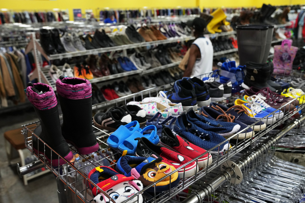FILE - The children's shoe section is seen at a Goodwill store in Roseville, Minn., Aug. 12, 2026. (AP Photo/Ellen Schmidt, File)
