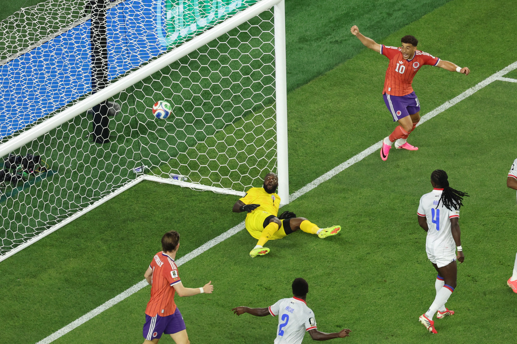Haiti goalkeeper Johny Placide (1) fails to save the goal during the World Cup Group C soccer match between Haiti and Scotland in Foxborough, Mass., near Boston, Saturday, June 13, 2026. (AP Photo/Mark Stockwell)