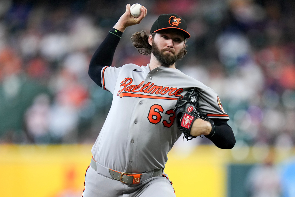 Baltimore Orioles starting pitcher Brandon Young throws to the Houston Astros during the first inning of a baseball game Sunday, July 19, 2026, in Houston. (AP Photo/Eric Christian Smith)