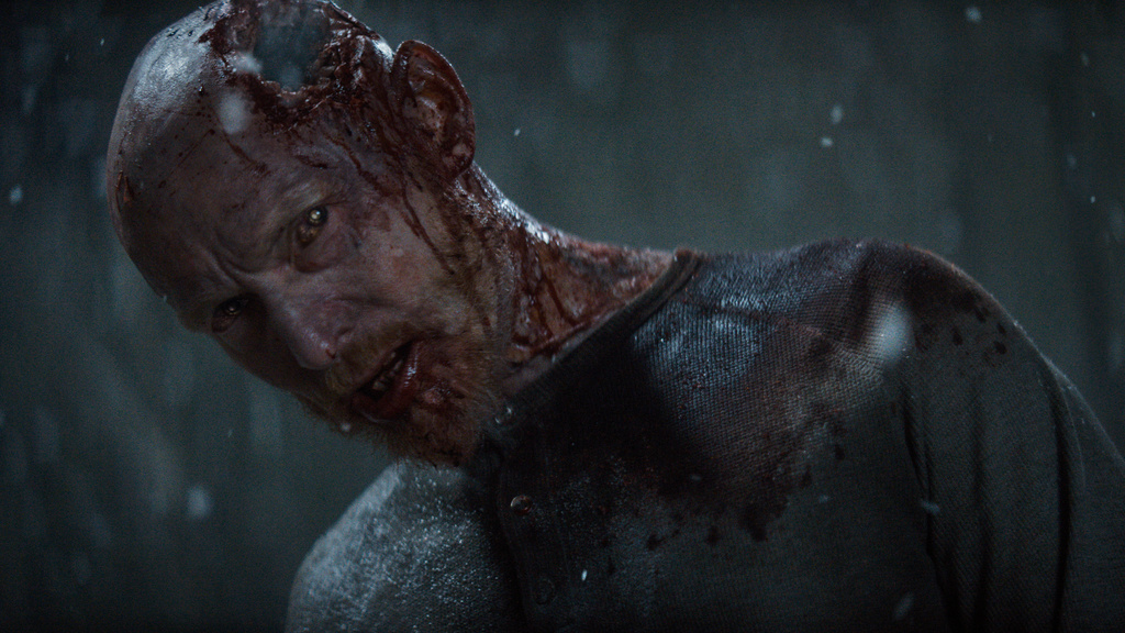 This image released by Warner Bros. Pictures shows Erroll Shand in a scene from "Evil Dead Burn." (Warner Bros. Pictures via AP)