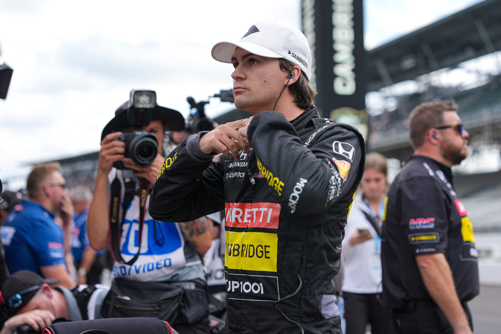 FILE - Colton Herta prepares to drive during qualifications for the Indianapolis 500 auto race at Indianapolis Motor Speedway in Indianapolis, May 17, 2025. (AP Photo/Michael Conroy, File)