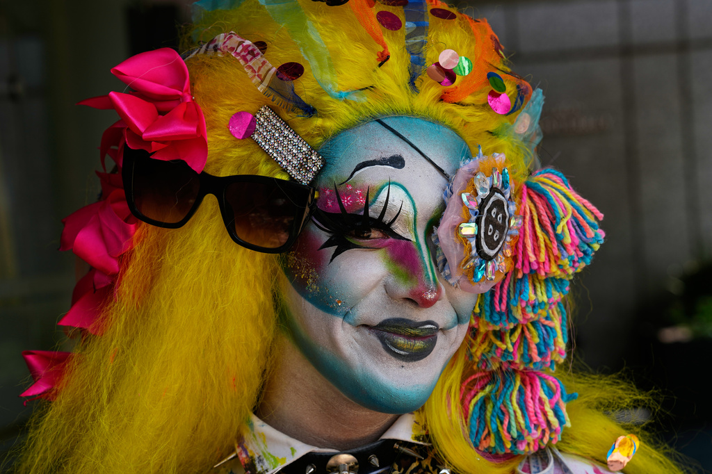 A participant strikes a pose during the annual Pride Parade in Mexico City, Saturday, June 26, 2026. (AP Photo/Marco Ugarte)