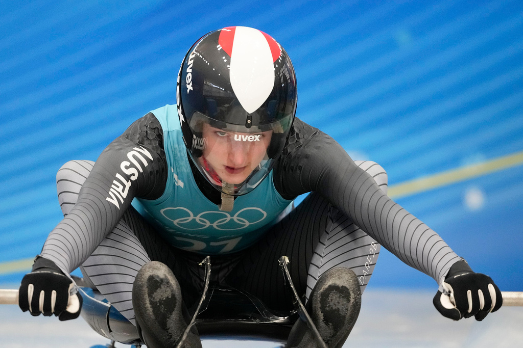 FILE - Madeleine Egle, of Austria, starts a luge women's singles training run at the 2022 Winter Olympics, on Feb. 5, 2022, in the Yanqing district of Beijing. (AP Photo/Dmitri Lovetsky, File)