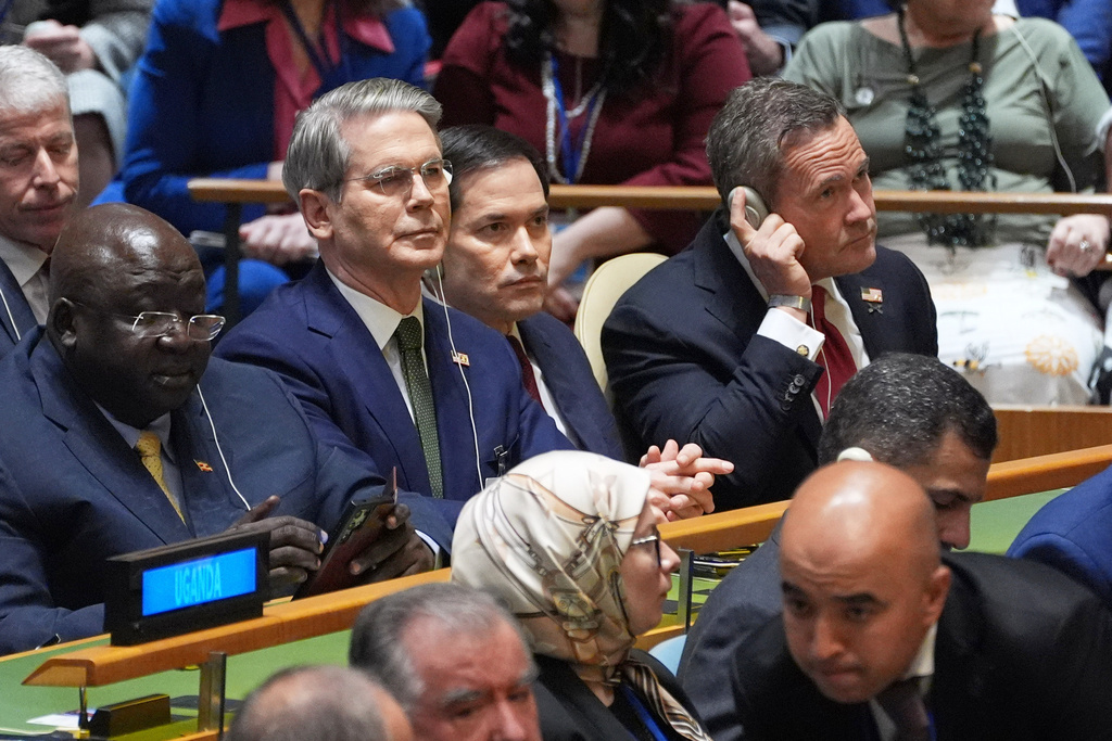 Treasury Secretary Scott Bessent, second from left, Secretary of State Marco Rubio and U.S. Ambassador to the UN Mike Waltz, listen as President Donald Trump speaks to the United Nations General Assembly, Sept. 23, 2025. (AP Photo/Evan Vucci, File)