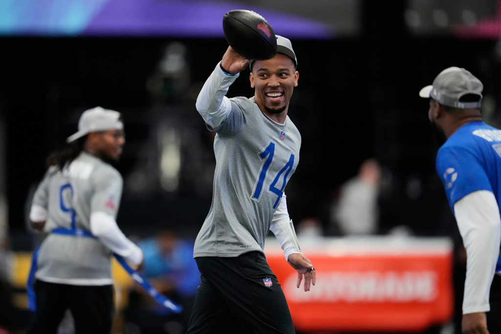 NFC wide receiver Amon-Ra St. Brown (14), of the Detroit Lions, runs with the ball during NFL Pro Bowl Games practice, Monday, Feb. 2, 2026, in San Francisco. (AP Photo/Godofredo A. Vásquez)