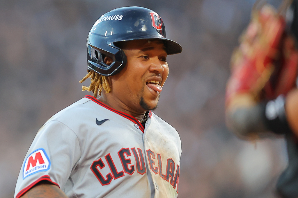 Cleveland Guardians' Jos&eacute; Ram&iacute;rez reacts after hitting a two-run triple against Chicago White Sox pitcher David Sandlin during the eighth inning in Game 3 of baseball's American League Division Series Wednesday, Oct. 7, 2026, in Chicago. (AP Photo/Melissa Tamez)