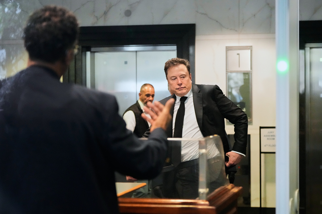 Elon Musk arrives at the U.S. District Court in Oakland, Calif., Tuesday, April 28, 2026. (AP Photo/Godofredo A. Vásquez)