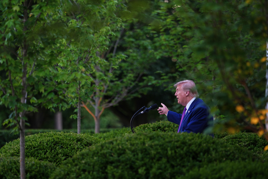 President Donald Trump speaks at a dinner for members of his administration and law enforcement organization leaders, during National Police Week, in the White House Rose Garden, Monday, May 11, 2026, in Washington. (AP Photo/Julia Demaree Nikhinson)