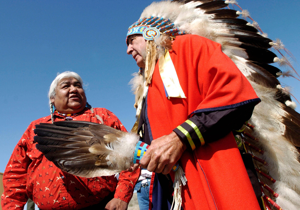 FILE - Kenny Frost, left, and former Colorado Sen. Ben Nighthorse Campbell speaks before the commemoration of the Sand Creek Massacre National Historic Site near Eads, Colo., April 28, 2008. (Kirk Speer/The Gazette via AP, File)