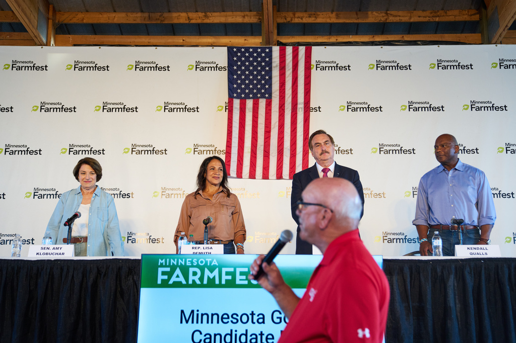Candidates for Minnesota governor, from left, Sen. Amy Klobuchar, D-Minn., Minnesota House Speaker Lisa Demuth, Mike Lindell and Kendall Qualls participate in a forum at Farmfest, Wednesday, Aug. 5, 2026, in Morgan, Minn. (AP Photo/Ellen Schmidt)