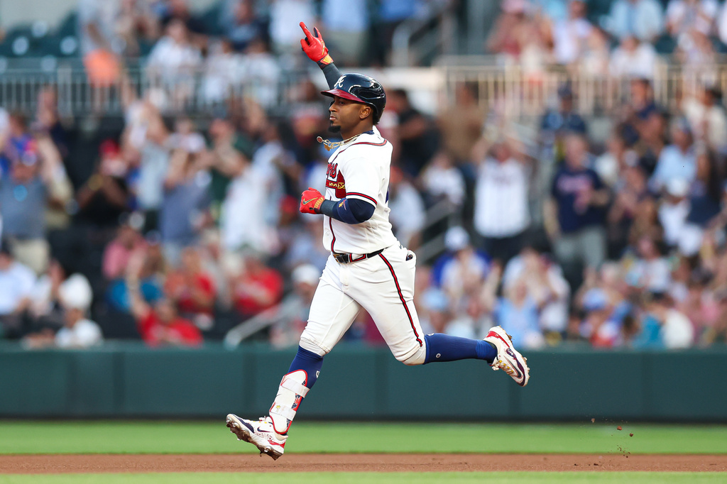 Atlanta Braves' Ozzie Albies rounds the bases after hitting a solo home run in the second inning of a baseball game against the Miami Marlins, Wednesday, April 15, 2026, in Atlanta. (AP Photo/Colin Hubbard)