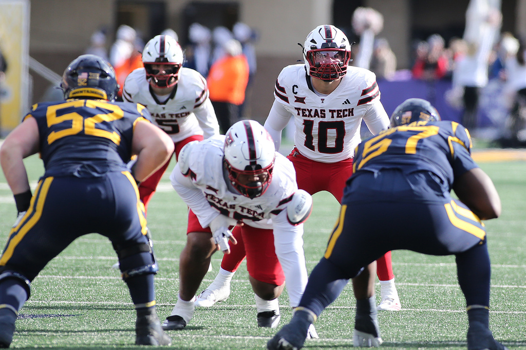 Texas Tech linebacker Jacob Rodriguez (10) lines up against West Virginia during the second half of an NCAA college football game Saturday, Nov. 29, 2025, in Morgantown, W.Va. (AP Photo/Kathleen Batten)